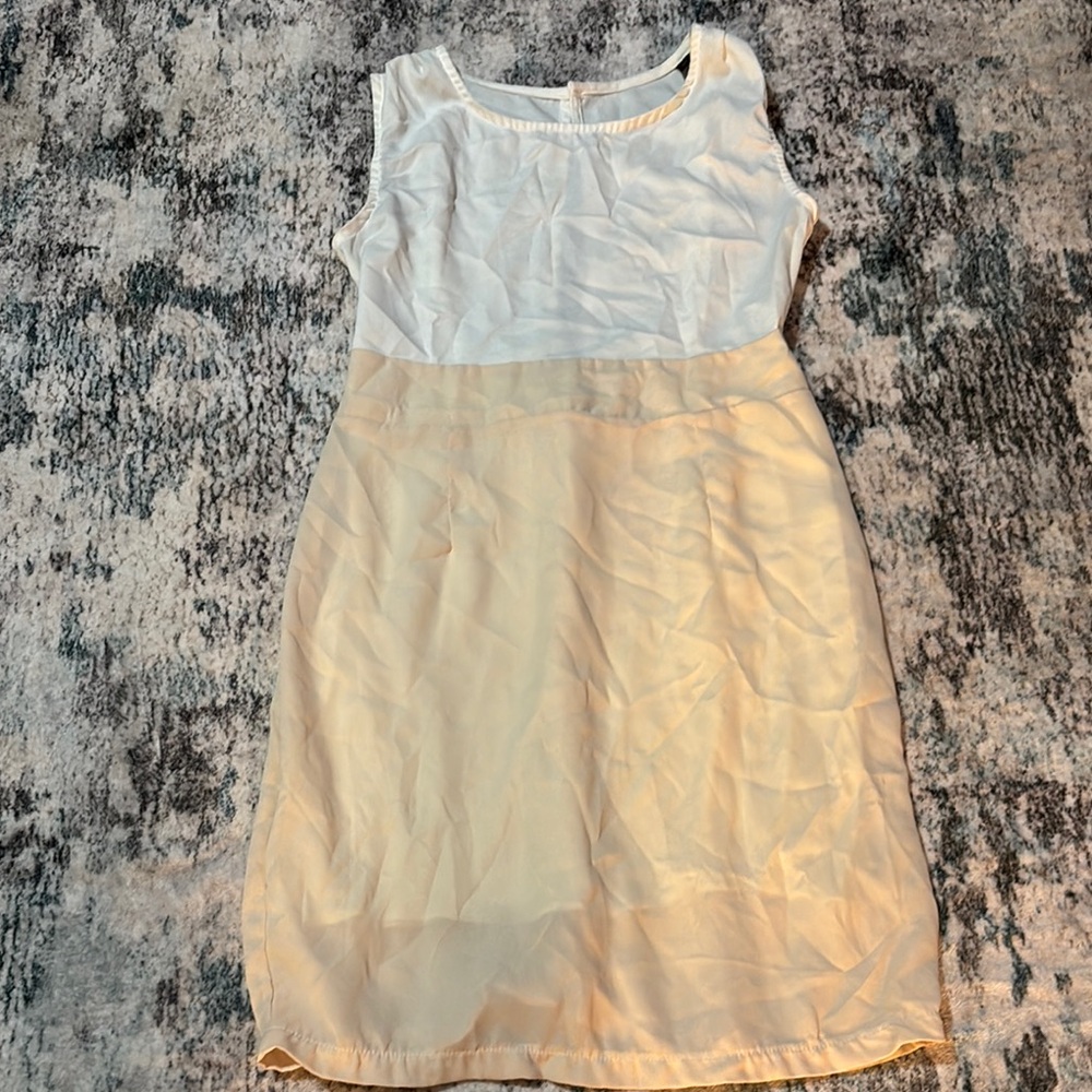 Elegant White and Cream Sleeveless Dress